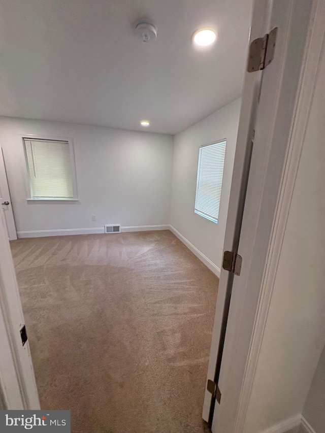 7915 New Second St, Elkins Park, PA 19027 - carpeted empty room featuring baseboards, recessed lighting, and a smoke detector