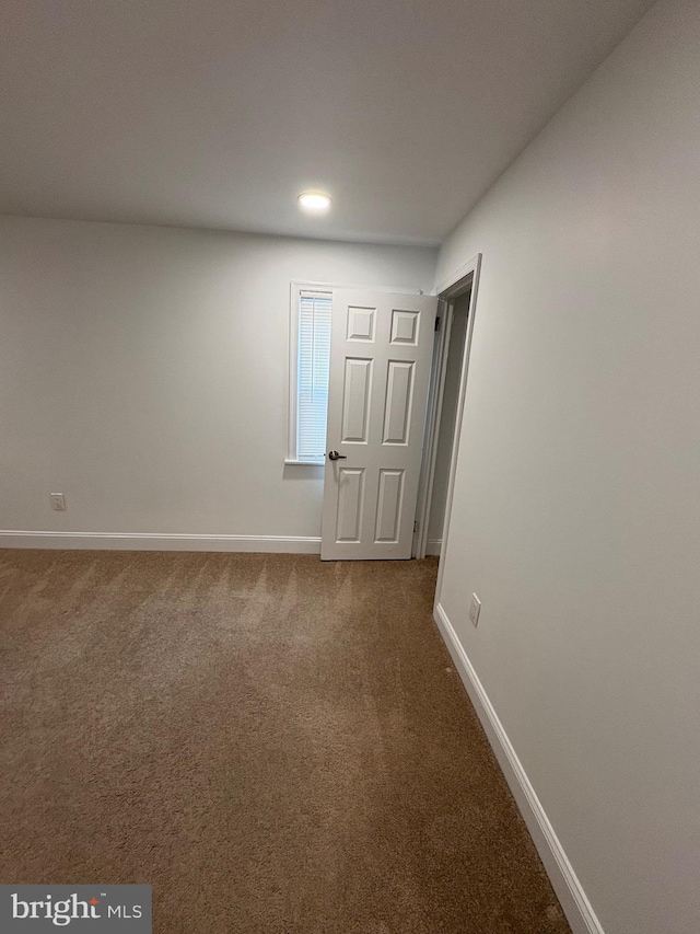 7915 New Second St, Elkins Park, PA 19027 - unfurnished room with baseboards, dark colored carpet, and recessed lighting