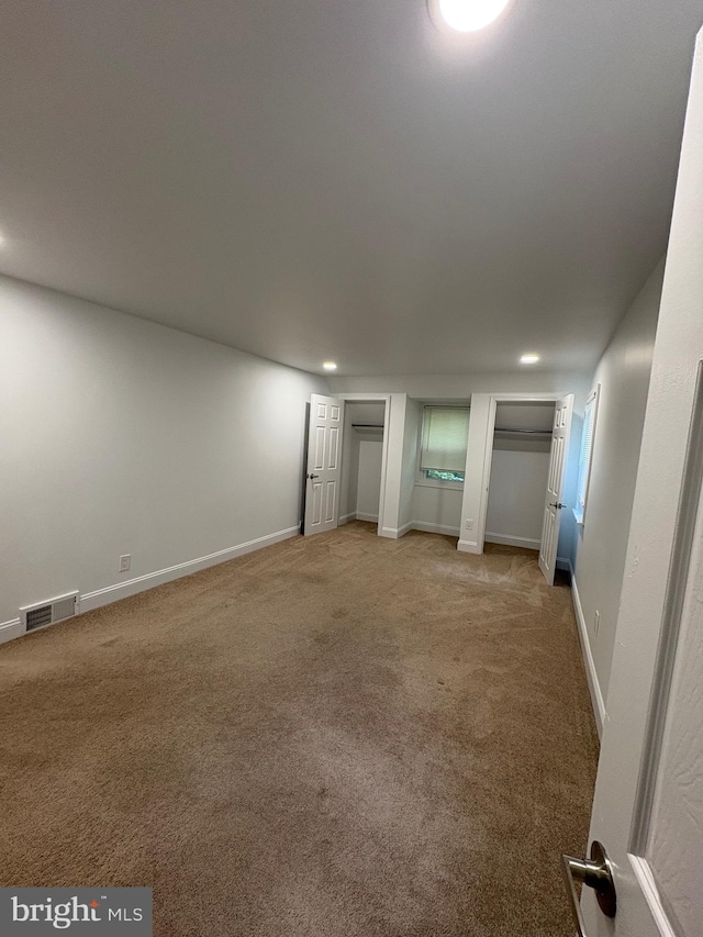 7915 New Second St, Elkins Park, PA 19027 - unfurnished living room featuring light colored carpet, recessed lighting, and baseboards