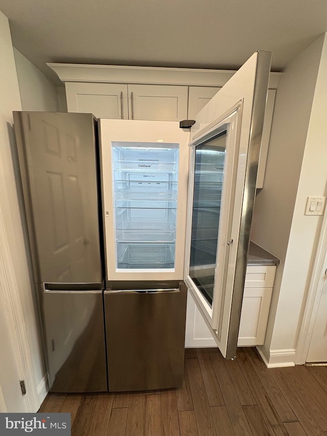 7915 New Second St, Elkins Park, PA 19027 - doorway with dark wood finished floors and baseboards