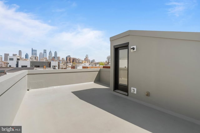 view of patio / terrace featuring a city view