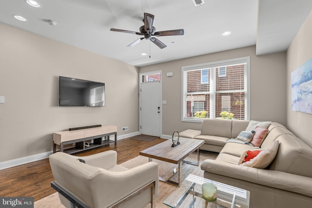 living room with recessed lighting, a ceiling fan, wood finished floors, and baseboards