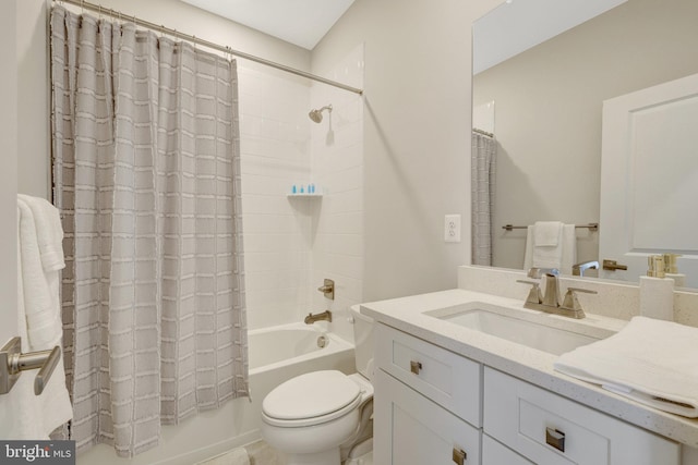 bathroom featuring shower / bath combination with curtain, toilet, and vanity