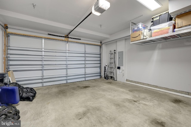 garage featuring a garage door opener and electric panel