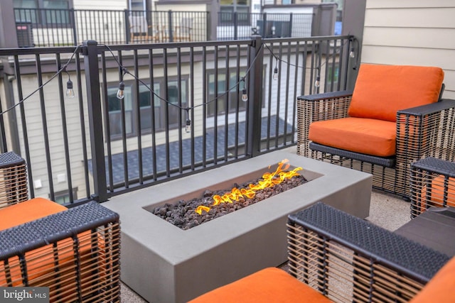 balcony featuring a fire pit