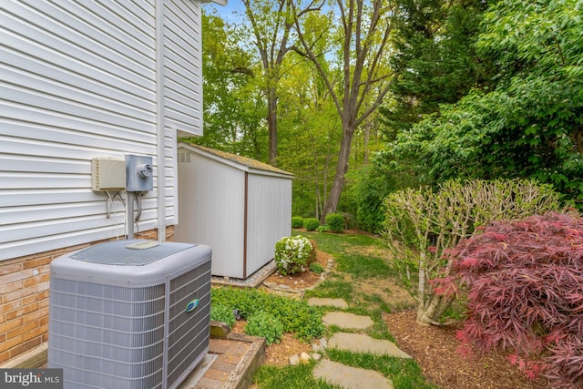 view of yard with central air condition unit