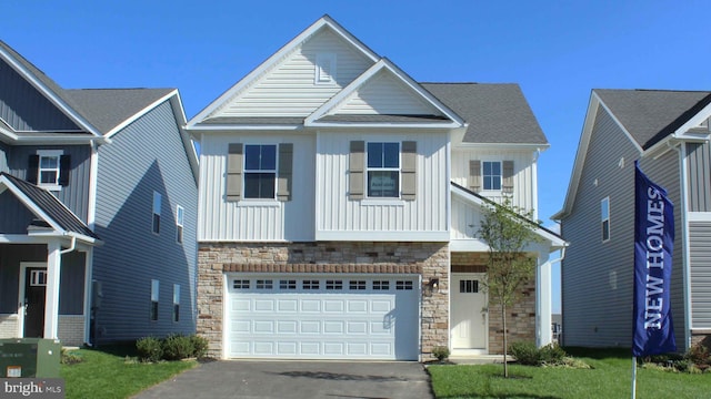 111 Yurok Ct, Winchester, VA 22602 - craftsman inspired home featuring aphalt driveway, stone siding, board and batten siding, and a garage