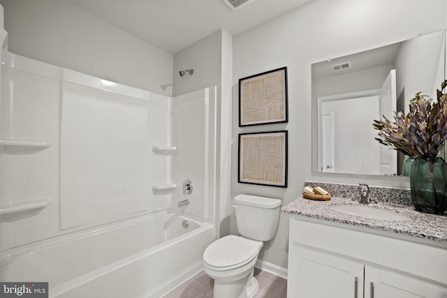 111 Yurok Ct, Winchester, VA 22602 - full bathroom featuring toilet, wood finished floors, vanity, baseboards, and visible vents