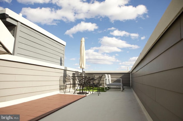 view of patio / terrace featuring a balcony