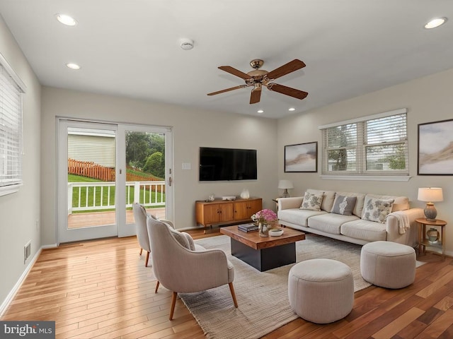 3826 Perryhurst, Nottingham, MD 21236 - living area featuring light wood finished floors, ceiling fan, recessed lighting, and baseboards