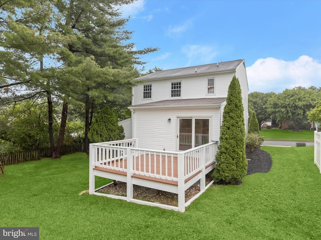 3826 Perryhurst, Nottingham, MD 21236 - back of house featuring a wooden deck and a lawn