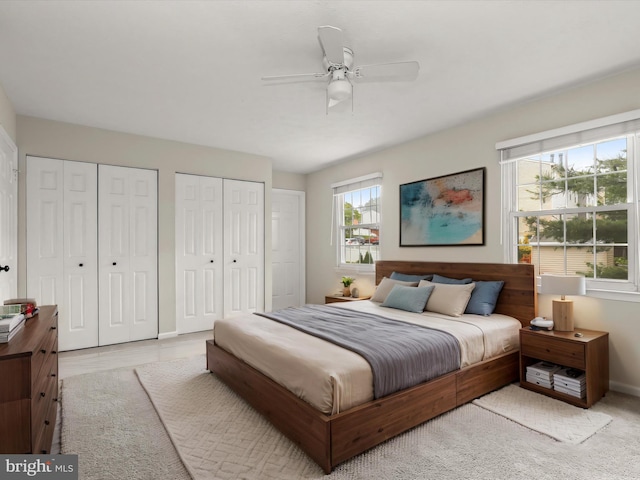 3826 Perryhurst, Nottingham, MD 21236 - bedroom featuring two closets, baseboards, and ceiling fan
