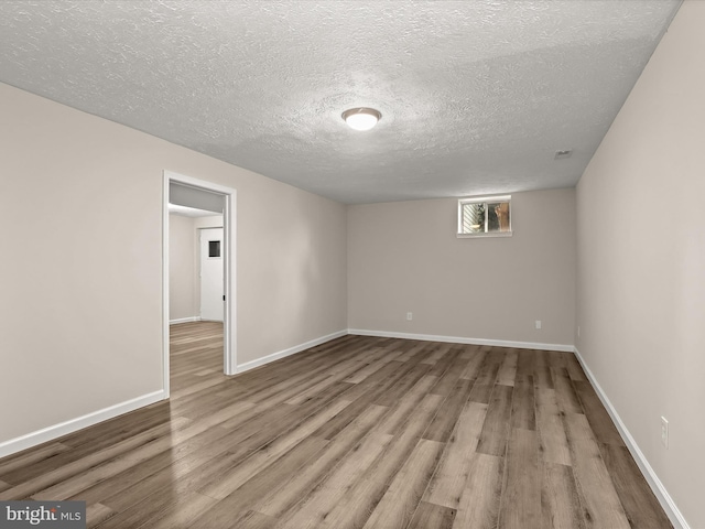 3826 Perryhurst, Nottingham, MD 21236 - spare room with wood finished floors, a textured ceiling, and baseboards