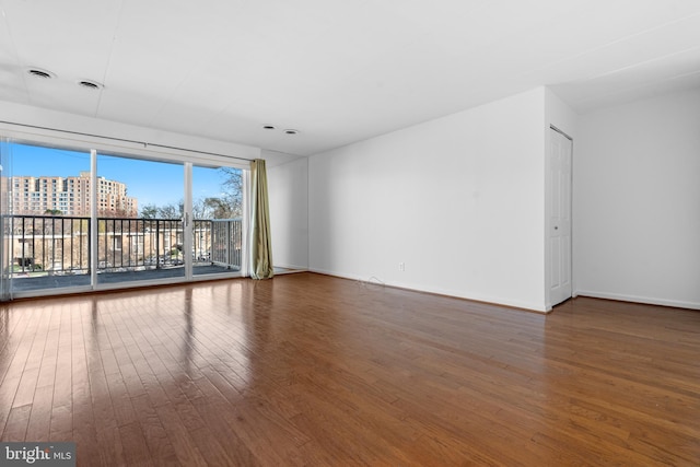 2648 Redcoat Dr Unit 99 1C, Alexandria, VA 22303 - unfurnished room featuring baseboards and wood finished floors