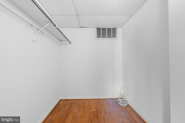 2648 Redcoat Dr Unit 99 1C, Alexandria, VA 22303 - walk in closet featuring visible vents, light wood-style floors, and a drop ceiling
