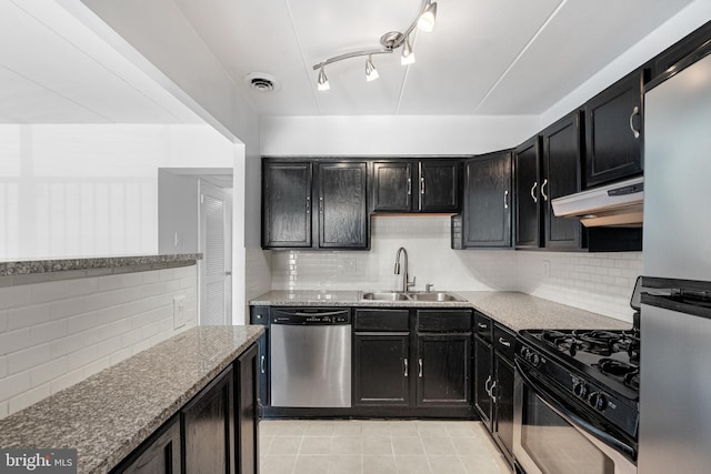 2648 Redcoat Dr Unit 99 1C, Alexandria, VA 22303 - kitchen featuring tasteful backsplash, stainless steel appliances, and dark cabinets