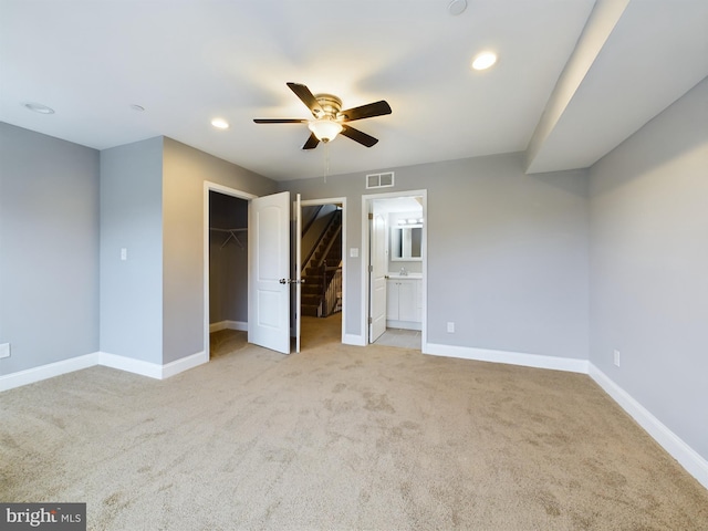 1519 E Chase St, Baltimore, MD 21213 - unfurnished bedroom with visible vents, recessed lighting, baseboards, and light carpet