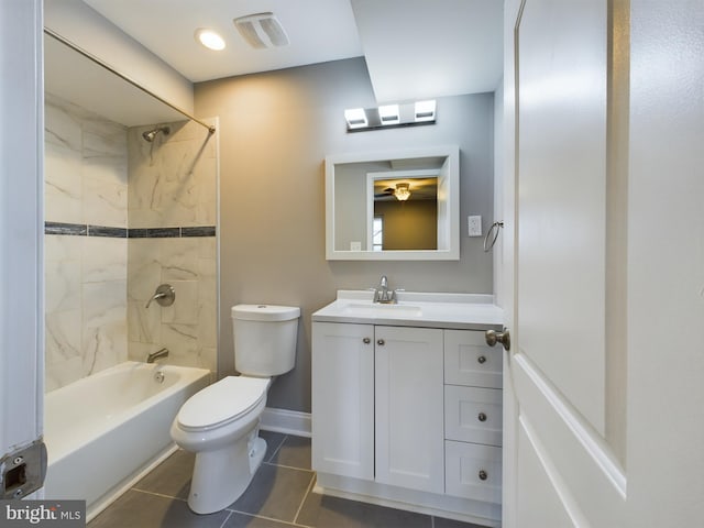 1519 E Chase St, Baltimore, MD 21213 - full bath with tile patterned flooring, vanity, shower / bathtub combination, toilet, and baseboards