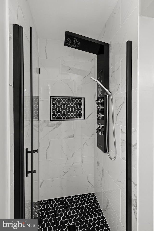 bathroom with a stall shower