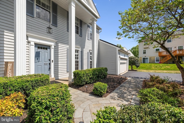 property entrance with a garage
