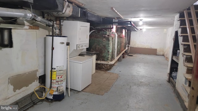 unfinished below grade area featuring water heater
