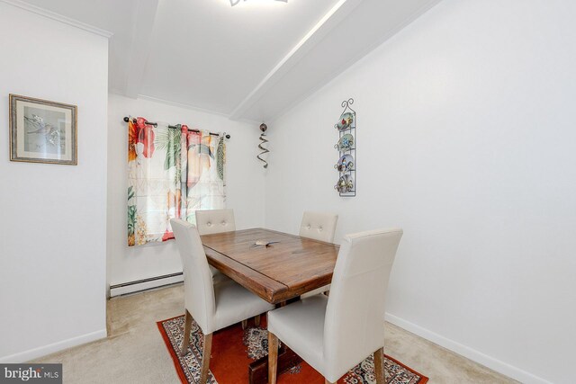 7010 Dover Ave, North Beach, MD 20714 - dining area with a baseboard radiator, light colored carpet, and baseboards
