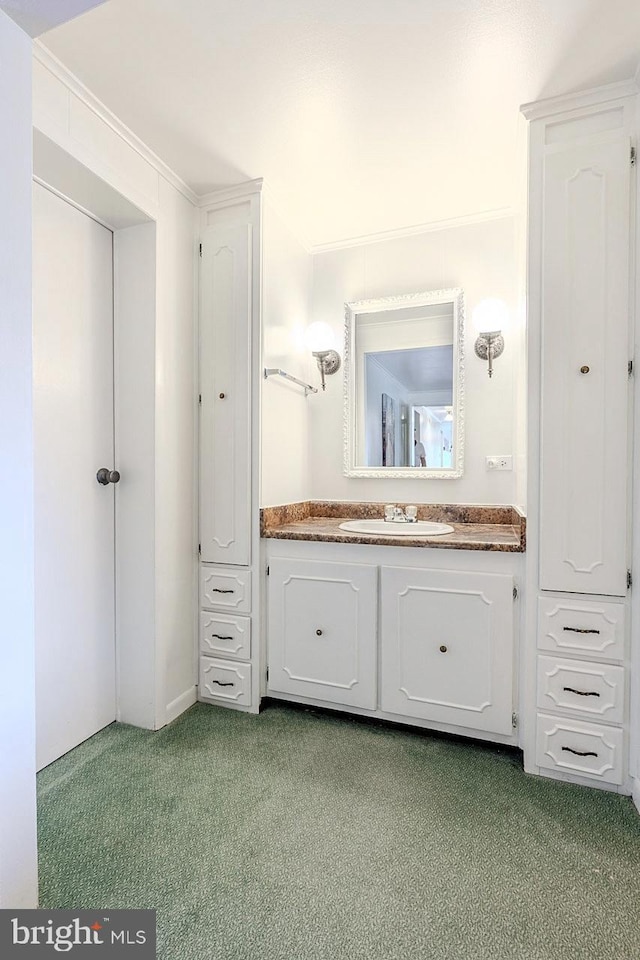 7010 Dover Ave, North Beach, MD 20714 - bathroom featuring carpet and vanity