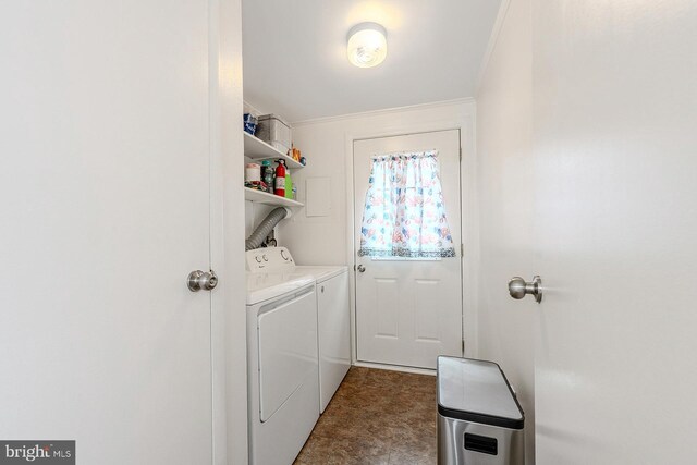 7010 Dover Ave, North Beach, MD 20714 - washroom with washing machine and clothes dryer and ornamental molding