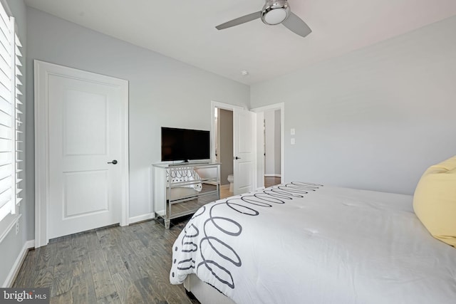 41972 Paddock Gate Pl, Ashburn, VA 20148 - bedroom with dark wood-style flooring, baseboards, and ceiling fan