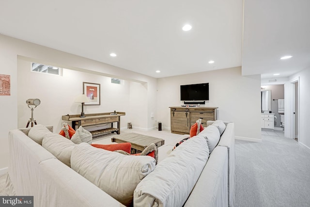 41972 Paddock Gate Pl, Ashburn, VA 20148 - living room featuring light carpet, baseboards, and recessed lighting