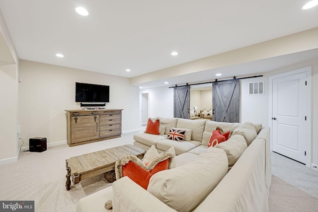 41972 Paddock Gate Pl, Ashburn, VA 20148 - living area with a barn door, carpet floors, recessed lighting, and baseboards