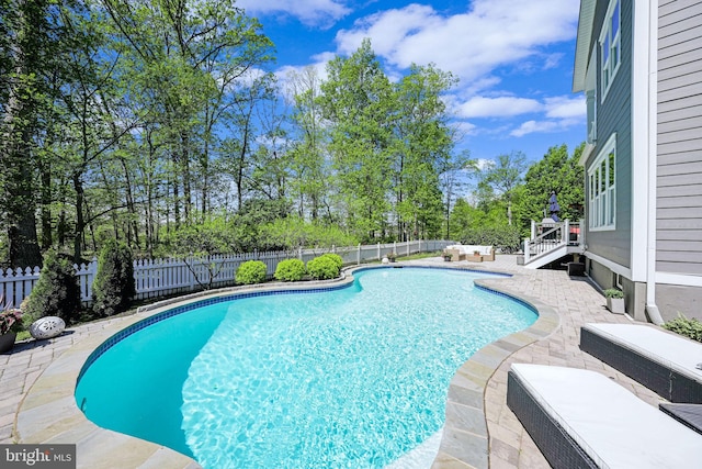 41972 Paddock Gate Pl, Ashburn, VA 20148 - view of swimming pool with a fenced backyard and a patio area