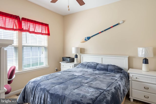 bedroom featuring carpet flooring, ceiling fan, and baseboards