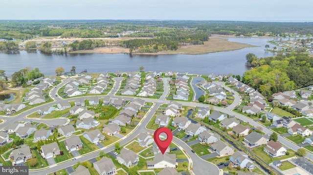 bird's eye view featuring a residential view and a water view
