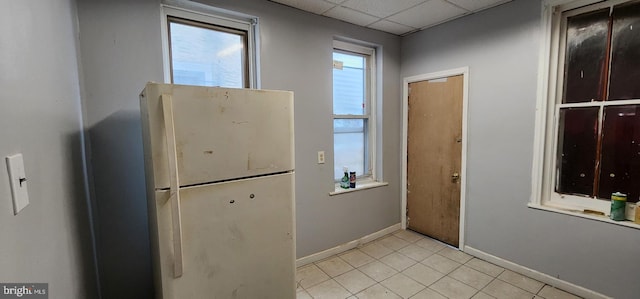 2641 N Bouvier St, Philadelphia, PA 19132 - entryway featuring baseboards, light tile patterned floors, and a drop ceiling