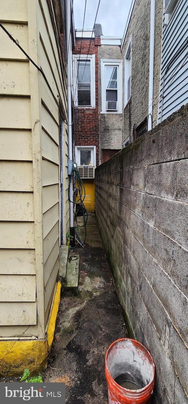2641 N Bouvier St, Philadelphia, PA 19132 - view of side of property featuring fence and cooling unit