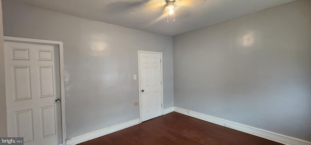 2641 N Bouvier St, Philadelphia, PA 19132 - unfurnished room featuring dark wood finished floors, baseboards, and a ceiling fan