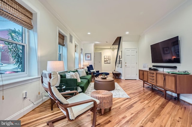 3223 Elliott St, Baltimore, MD 21224 - living area with ornamental molding, light wood-style flooring, recessed lighting, and baseboards