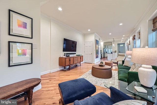 3223 Elliott St, Baltimore, MD 21224 - living area with ornamental molding, light wood-type flooring, recessed lighting, and baseboards