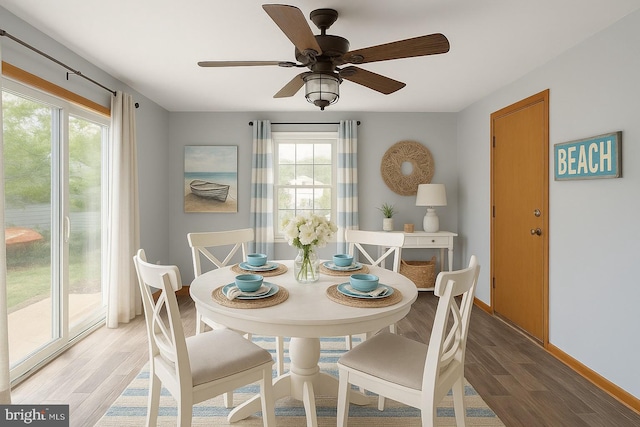 79 Darl Cir, Colonial Beach, VA 22443 - dining room featuring a healthy amount of sunlight, light wood finished floors, and baseboards