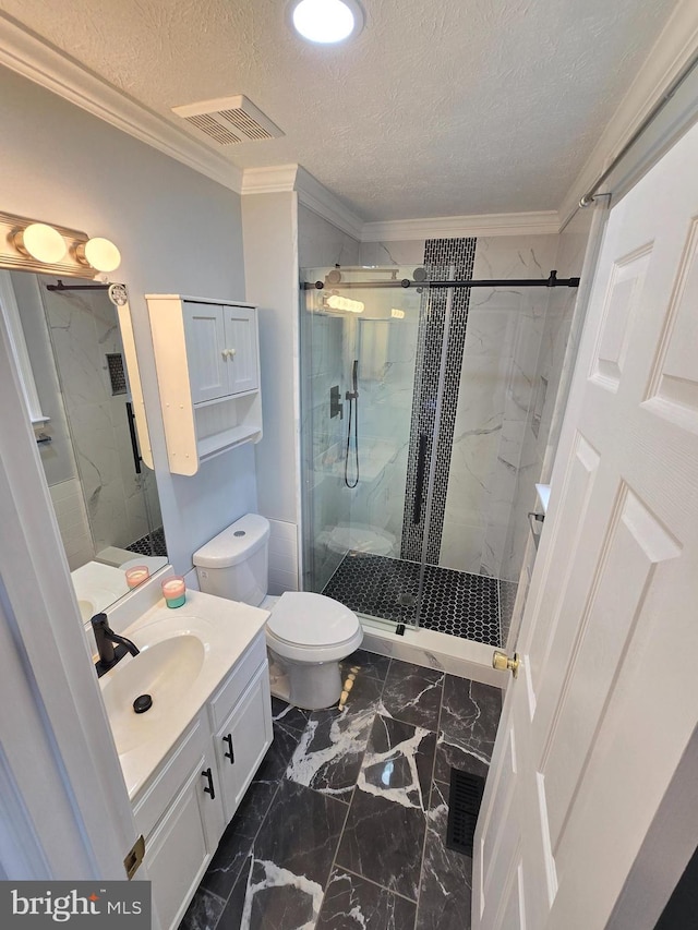 full bath featuring crown molding, visible vents, a marble finish shower, vanity, and marble finish floor