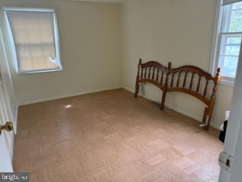interior space with baseboards