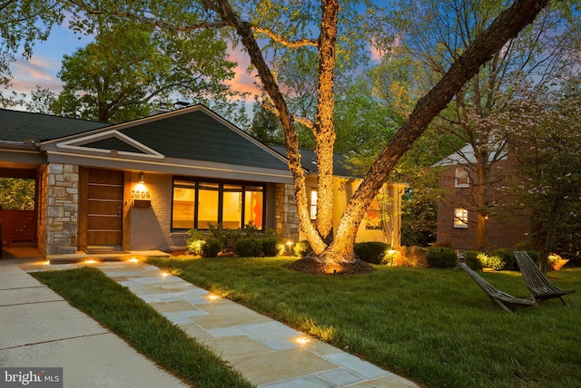 2006 Scroggins Rd, Alexandria, VA 22302 - view of front of home with a yard