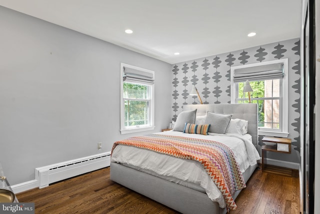 2006 Scroggins Rd, Alexandria, VA 22302 - bedroom featuring baseboards, recessed lighting, a baseboard heating unit, and wood finished floors