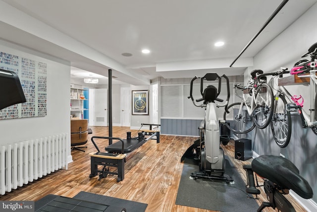 2006 Scroggins Rd, Alexandria, VA 22302 - exercise room with recessed lighting, wood finished floors, and radiator