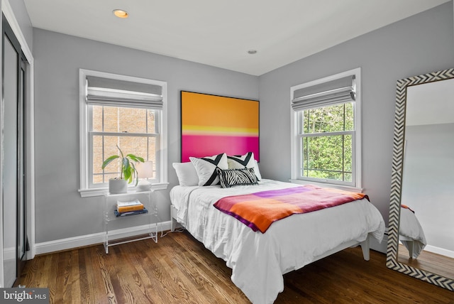 2006 Scroggins Rd, Alexandria, VA 22302 - bedroom with baseboards and wood finished floors