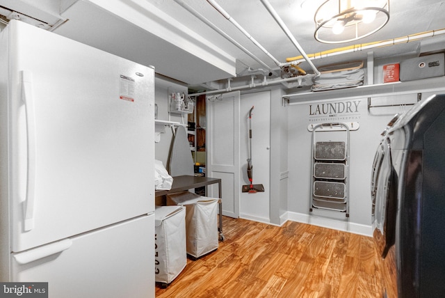 2006 Scroggins Rd, Alexandria, VA 22302 - interior space with freestanding refrigerator and light wood-style flooring