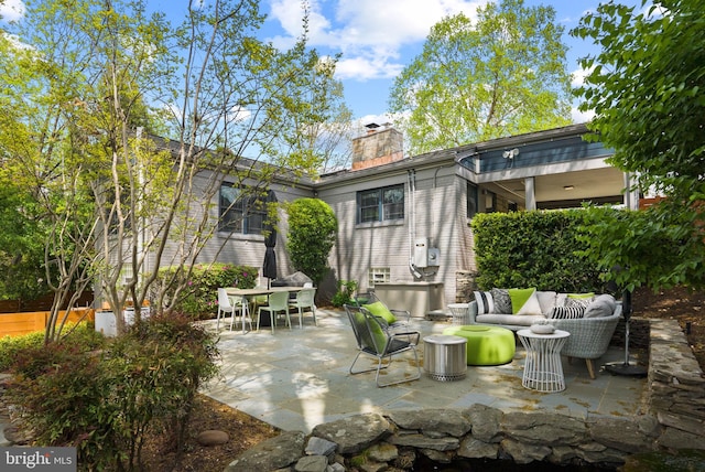 2006 Scroggins Rd, Alexandria, VA 22302 - view of patio featuring an outdoor hangout area