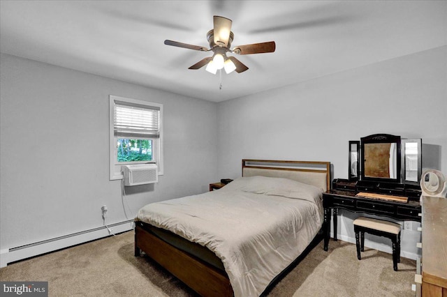 bedroom with baseboard heating, carpet floors, ceiling fan, and baseboards