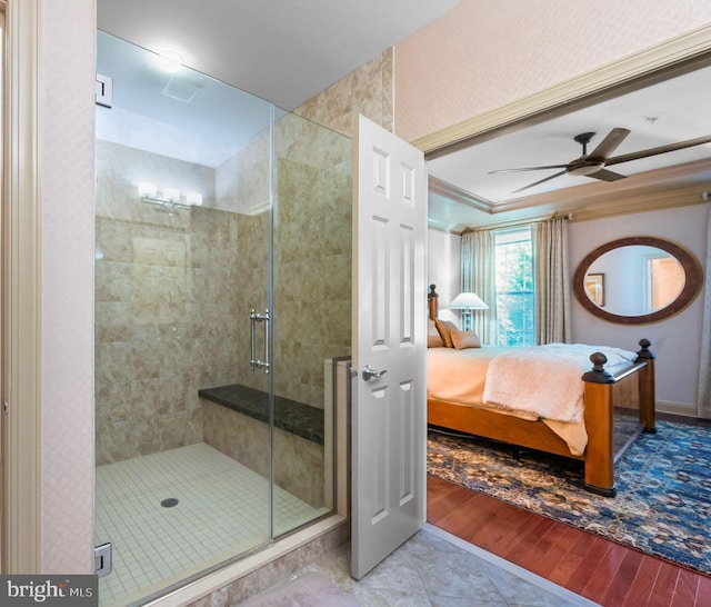 full bathroom with crown molding, a shower stall, ensuite bathroom, and wood finished floors